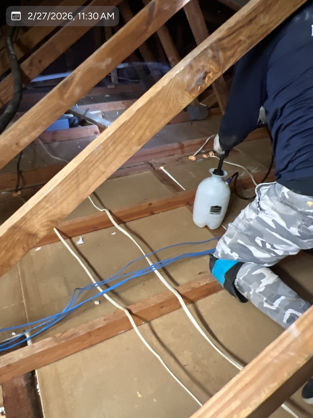 MVP crew preparing an attic before installing insulation