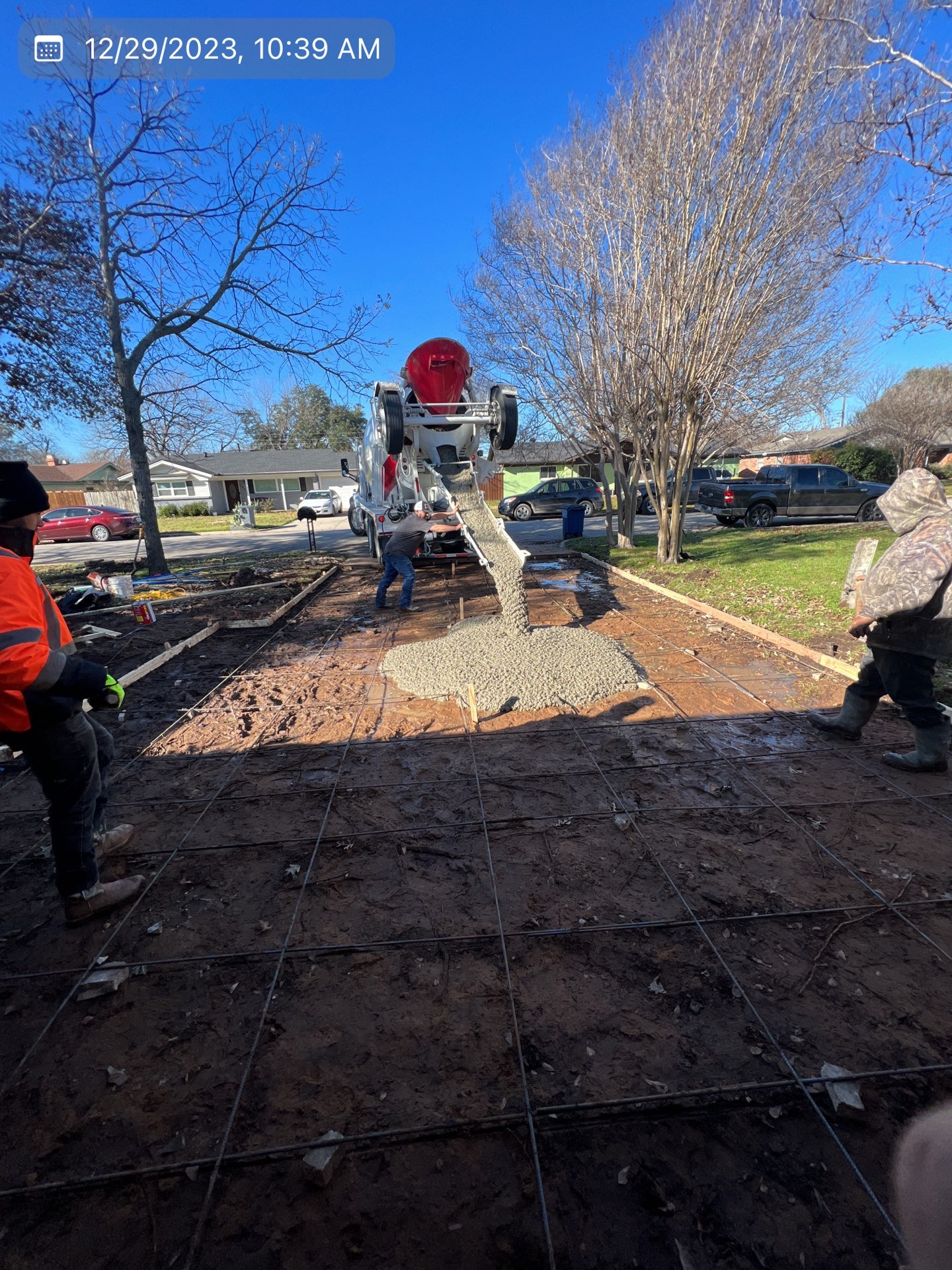 Concrete being poured for an MVP driveway project