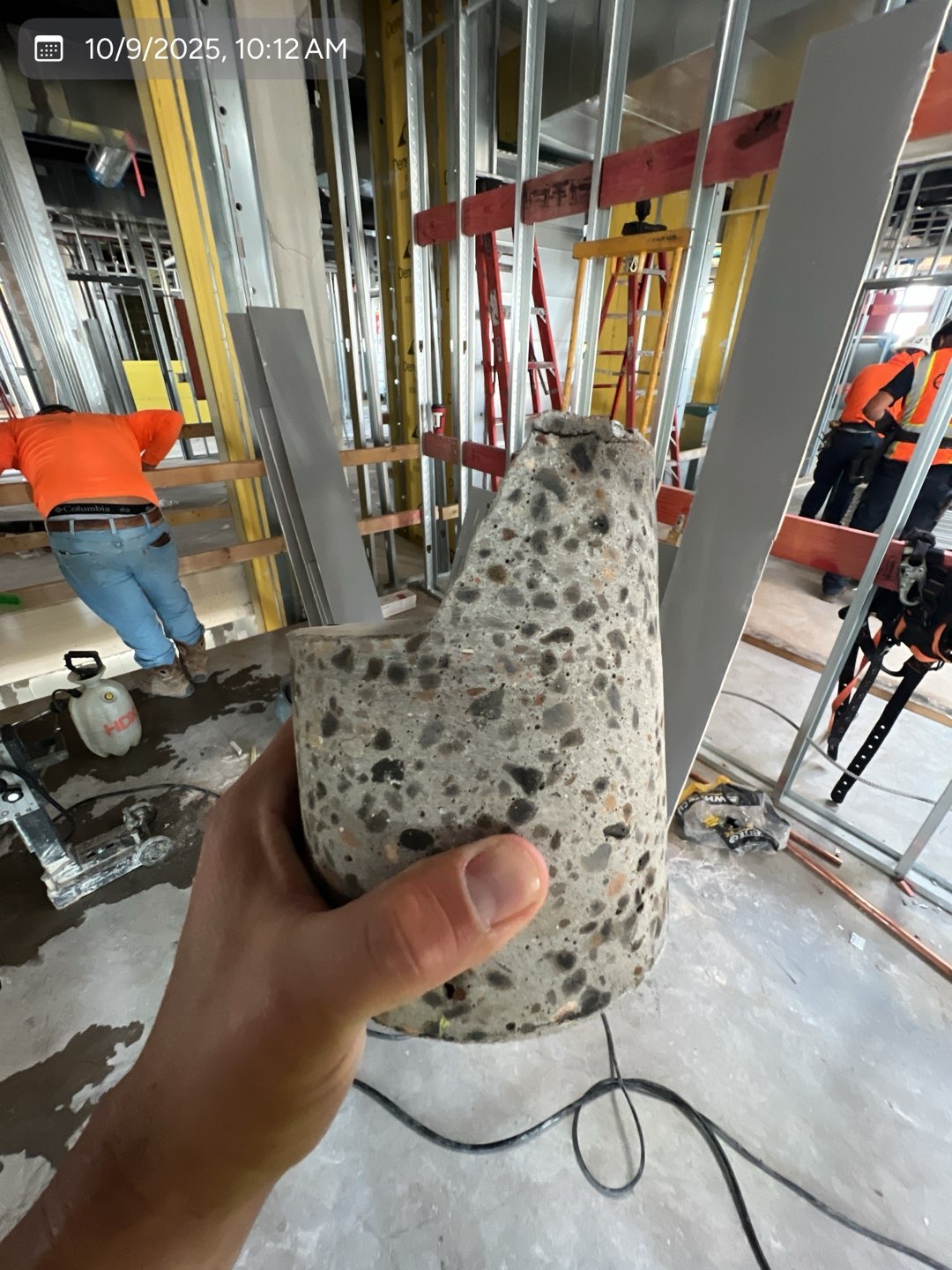 Concrete core sample removed during commercial core-drilling work