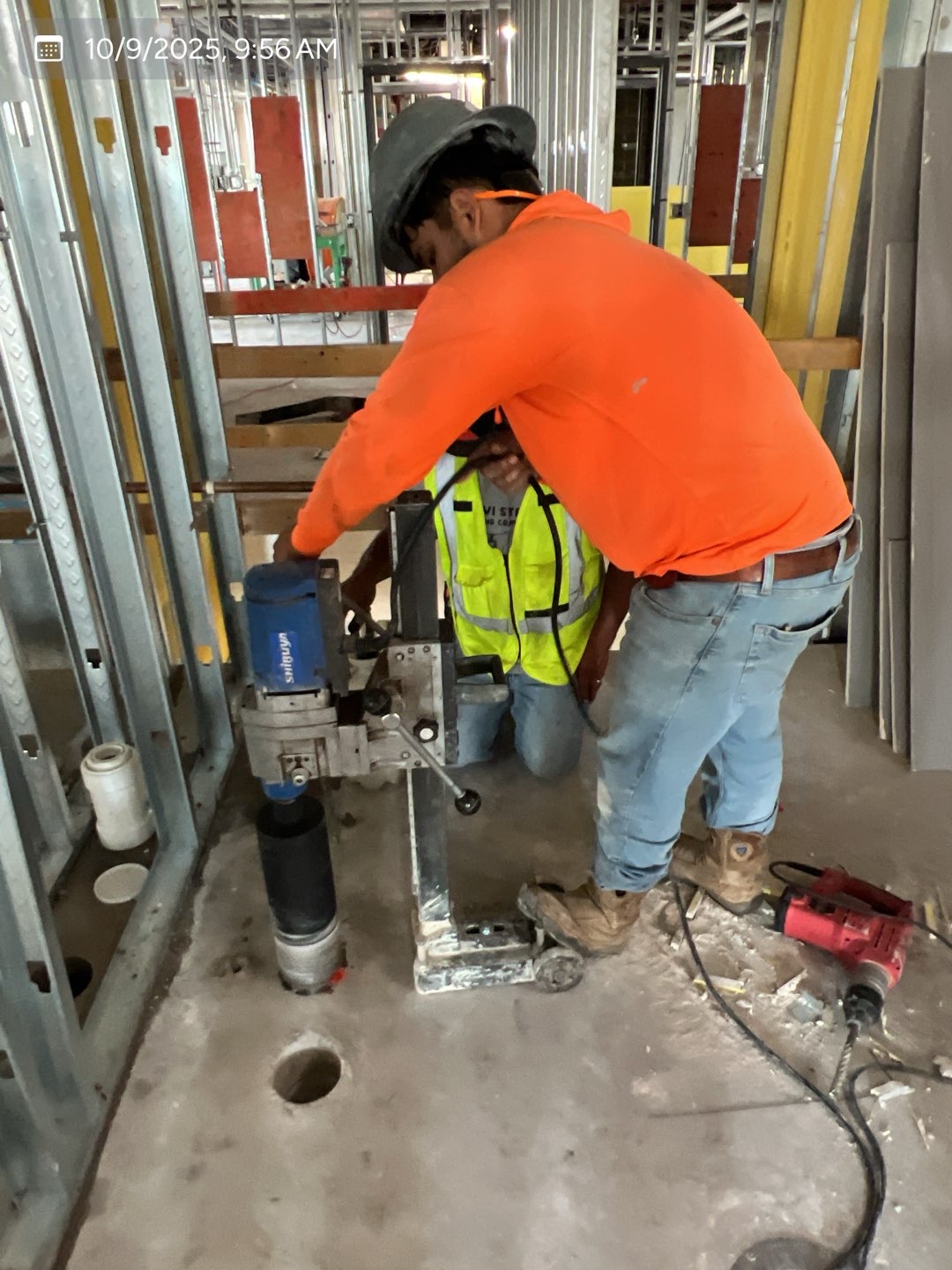 MVP crew operating core-drilling equipment during a commercial repair project