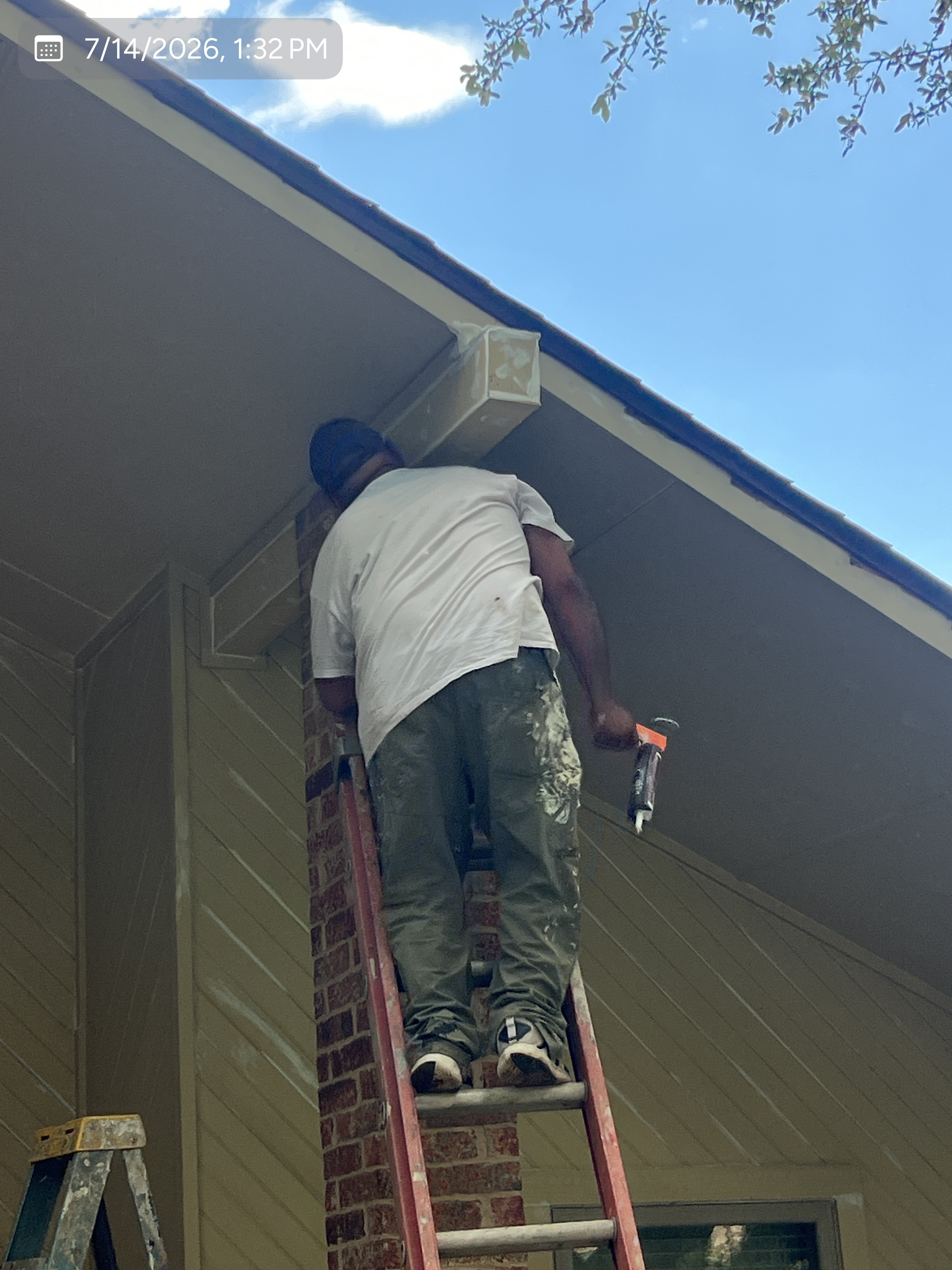 MVP crew member completing exterior trim work on a DFW home