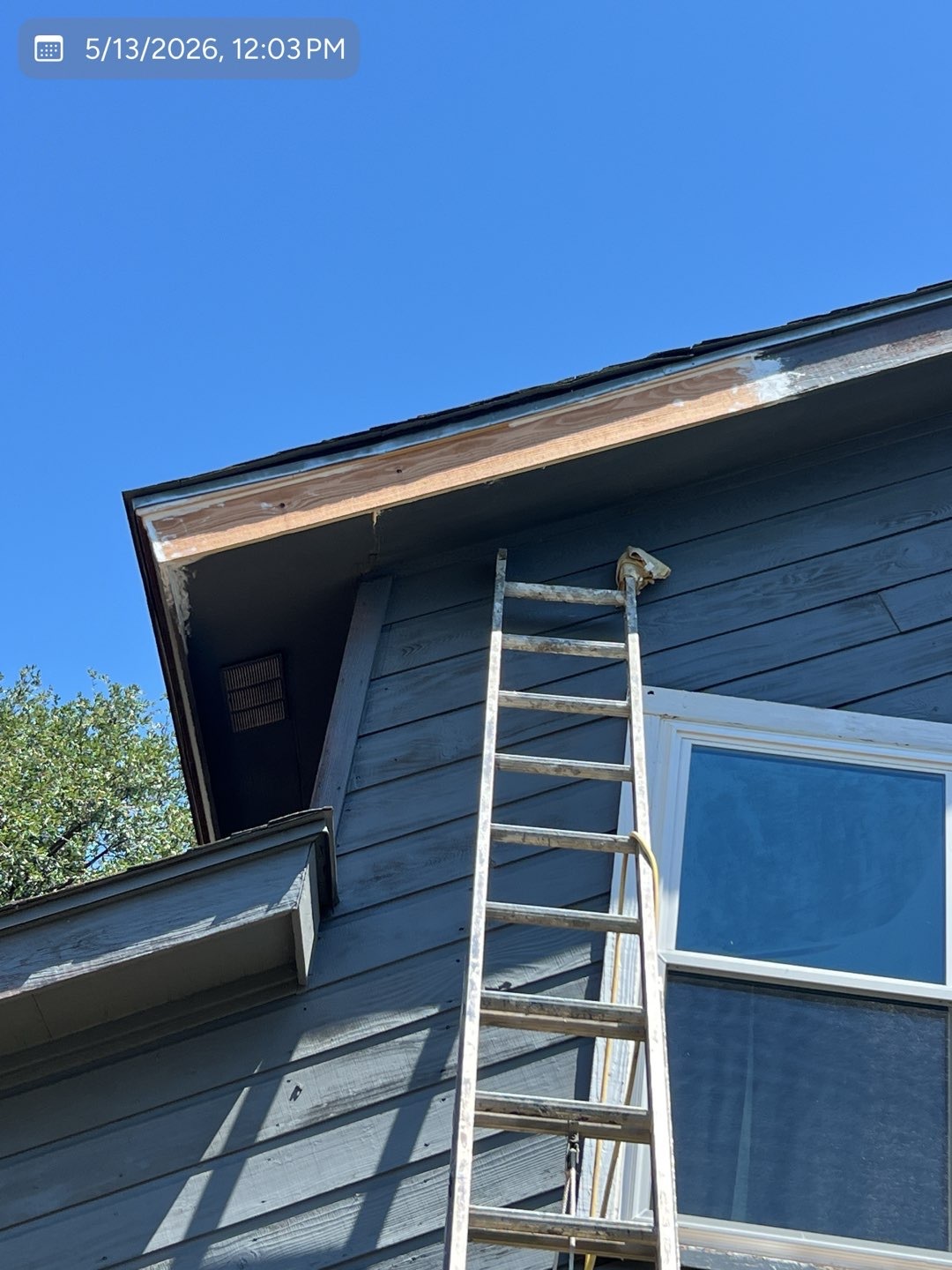 Exterior fascia being repaired after damage caused by rodents