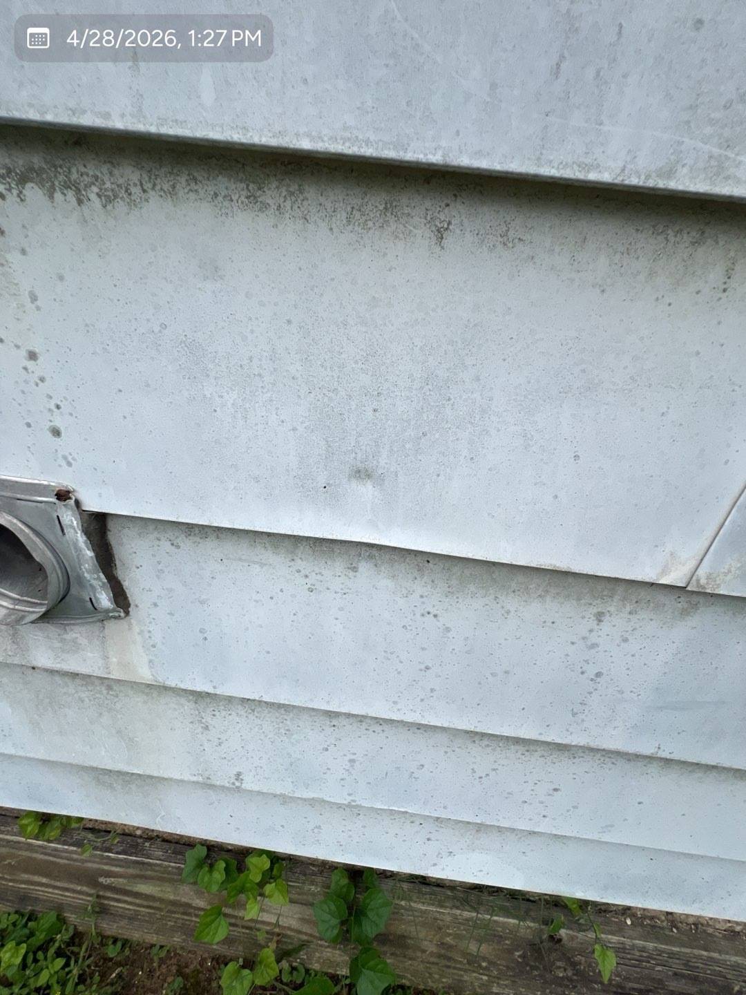 Hail impact documented on aluminum siding