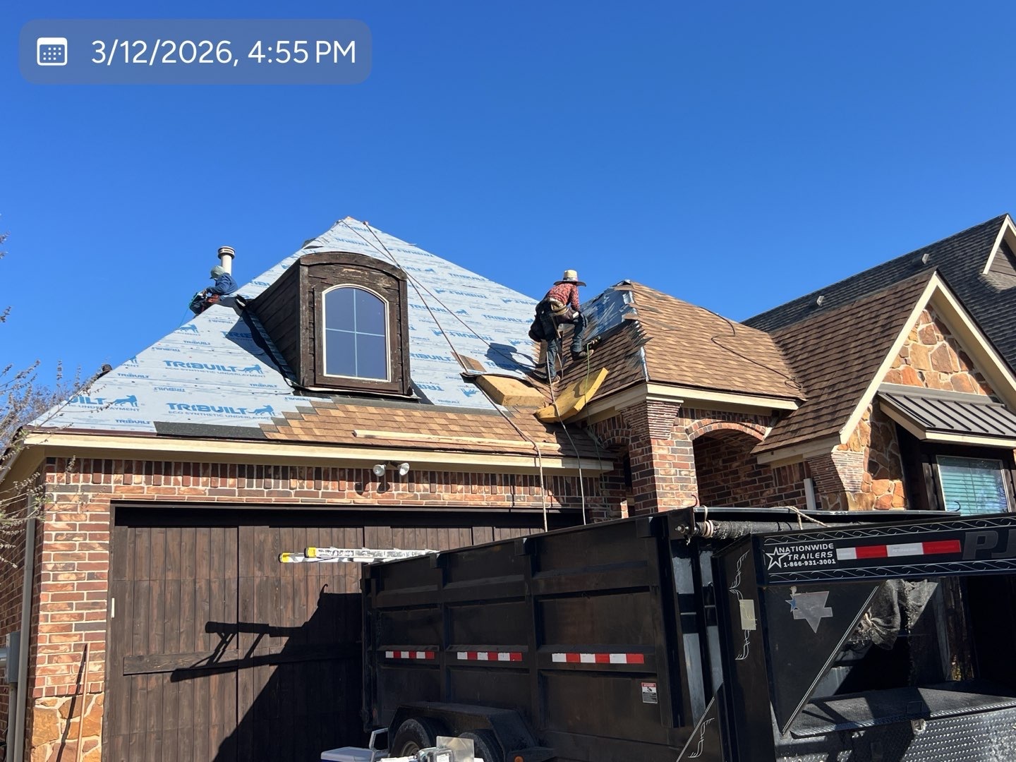 MVP roofing crew installing underlayment and shingles on a DFW home