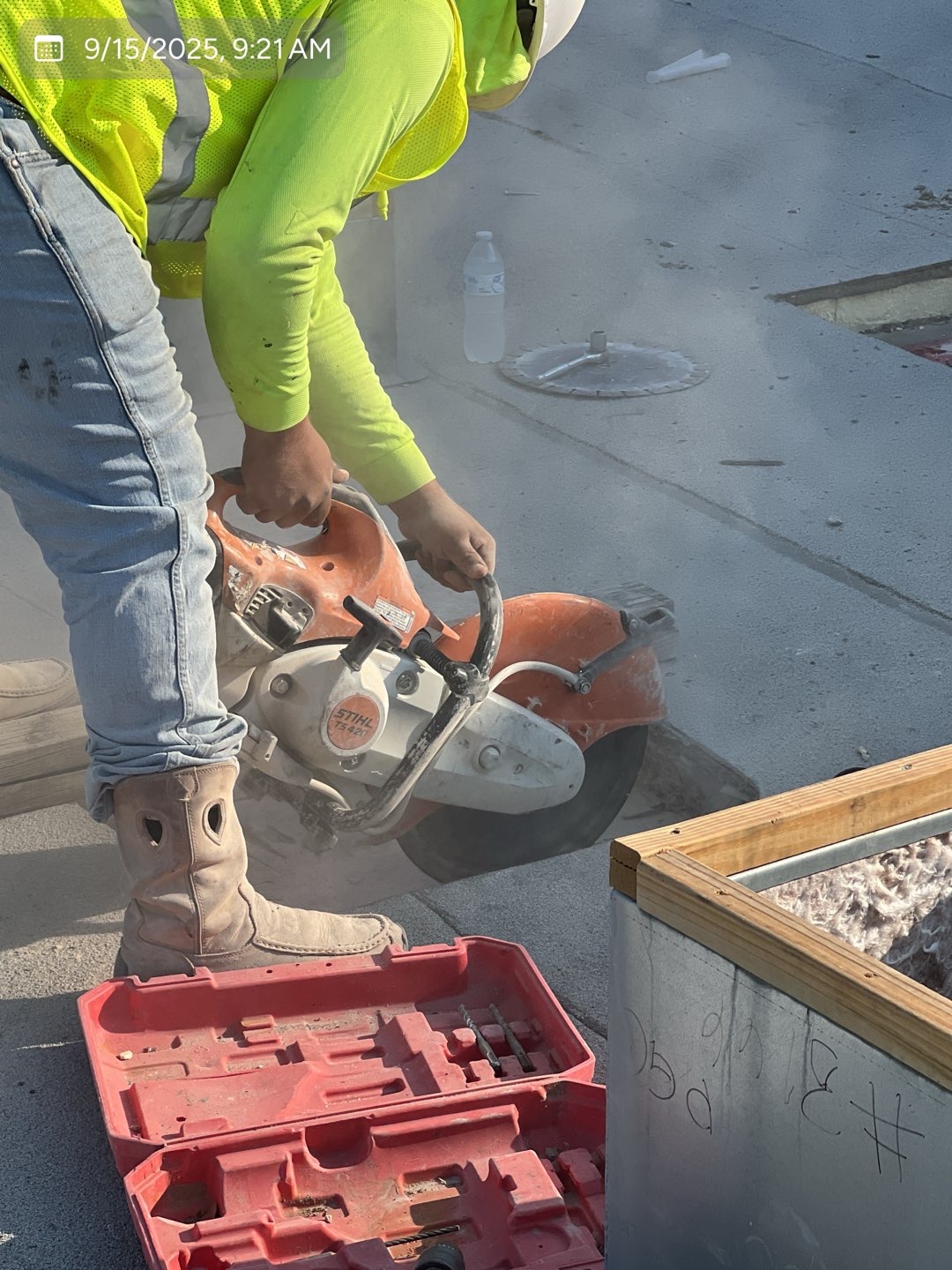 Professional saw-cutting equipment at a commercial project