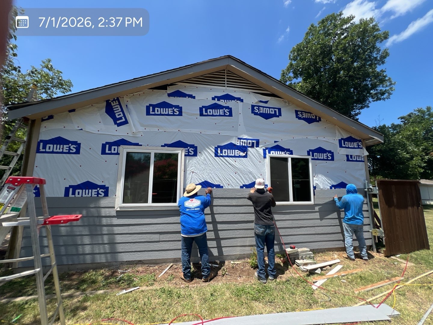 MVP crew installing residential siding